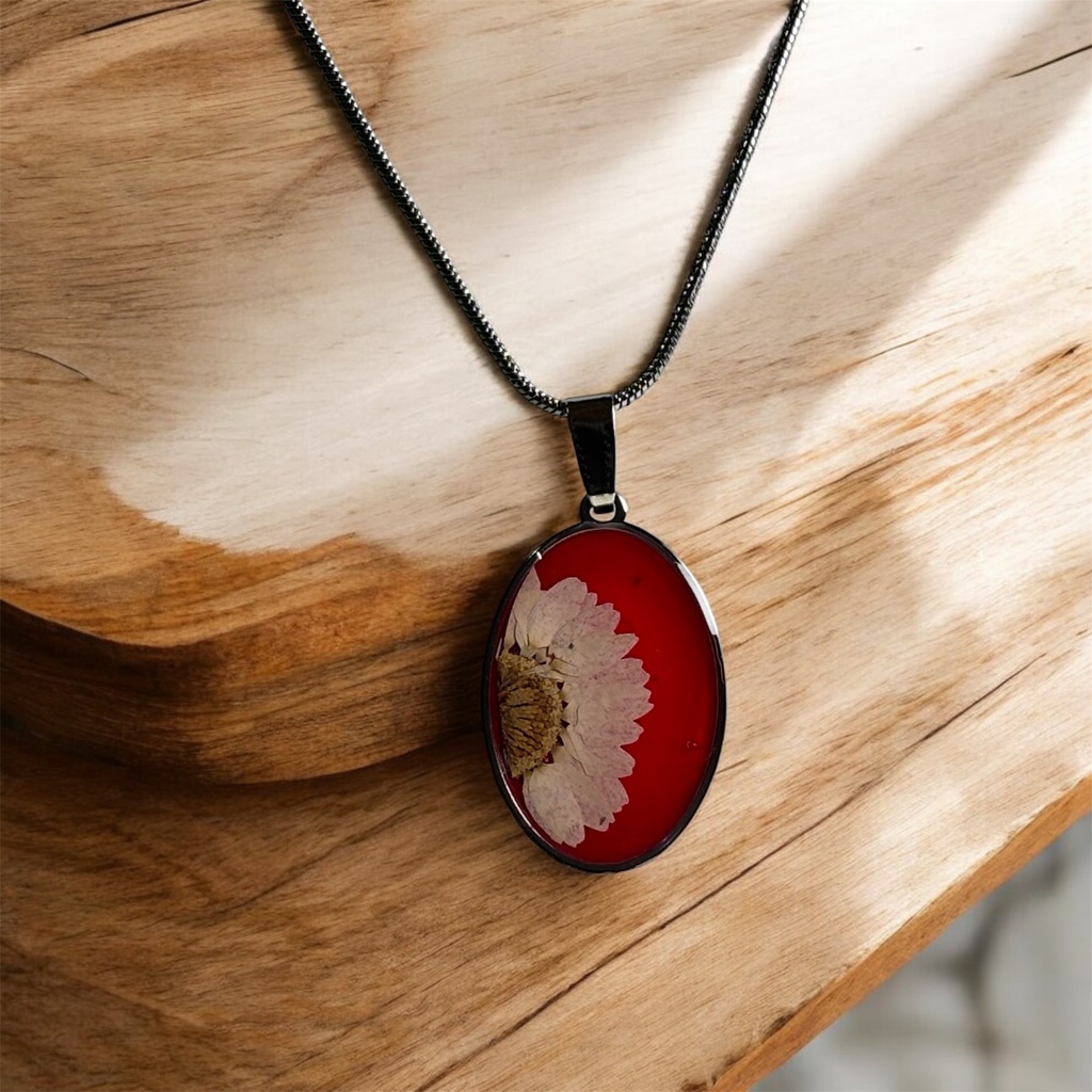 Real flower pendant on vibrant red base – Handmade skinny resin design